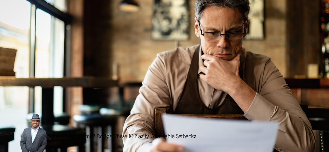 Man in a brown shirt sitting at a table, reading a document with a thoughtful expression. The background shows a rustic setting with wooden furniture and soft lighting. In the bottom left corner, a small image of a smiling man in a suit and hat is overlaid. Text reads, 'Selling Your Home? Dodge These 10 Easily Avoidable Setbacks.'