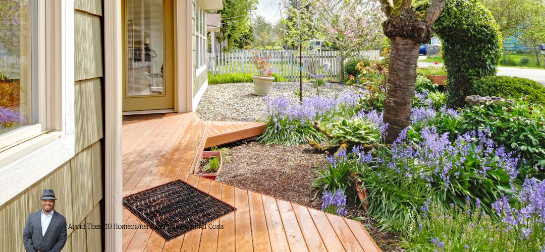 A well-maintained wooden deck leads to a garden filled with purple flowers and lush greenery. A tree stands prominently in the garden, with a white picket fence visible in the background. A welcome mat is placed on the deck near a glass door leading into the house. In the lower left corner, there is a small image of a man in a suit and hat with text reading, "Avoid These 10 Homeownership Mistakes at All Costs."