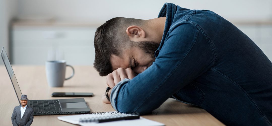 A man in a denim shirt leans forward with his head resting on his folded arms on a desk, appearing stressed or tired. In front of him are a laptop, a smartphone, and a coffee mug. A small, cutout image of a person in business attire is in the bottom left corner. Overlay text at the bottom reads, "Home Sweet Home? Avoid These Common Buyer Mistakes in Prince William County."