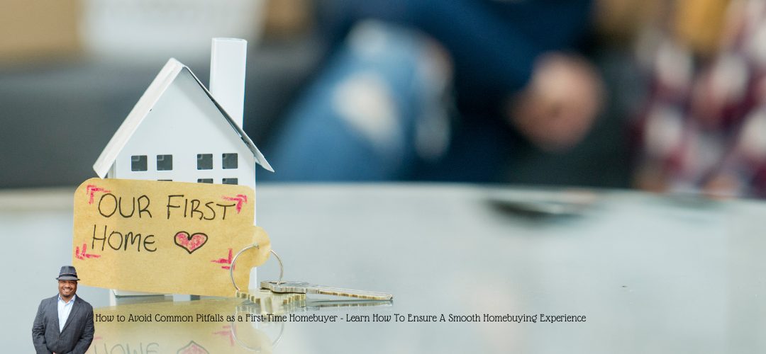 A small paper house model on a table with a key beside it. A tag attached to the house reads "OUR FIRST HOME" with a heart symbol. In the background, a blurred figure is visible. A person in a suit and hat is in the foreground. The text overlay at the bottom says: "How to Avoid Common Pitfalls as a First-Time Homebuyer - Learn How to Ensure a Smooth Homebuying Experience." The image conveys themes of new beginnings and the pursuit of homeownership.