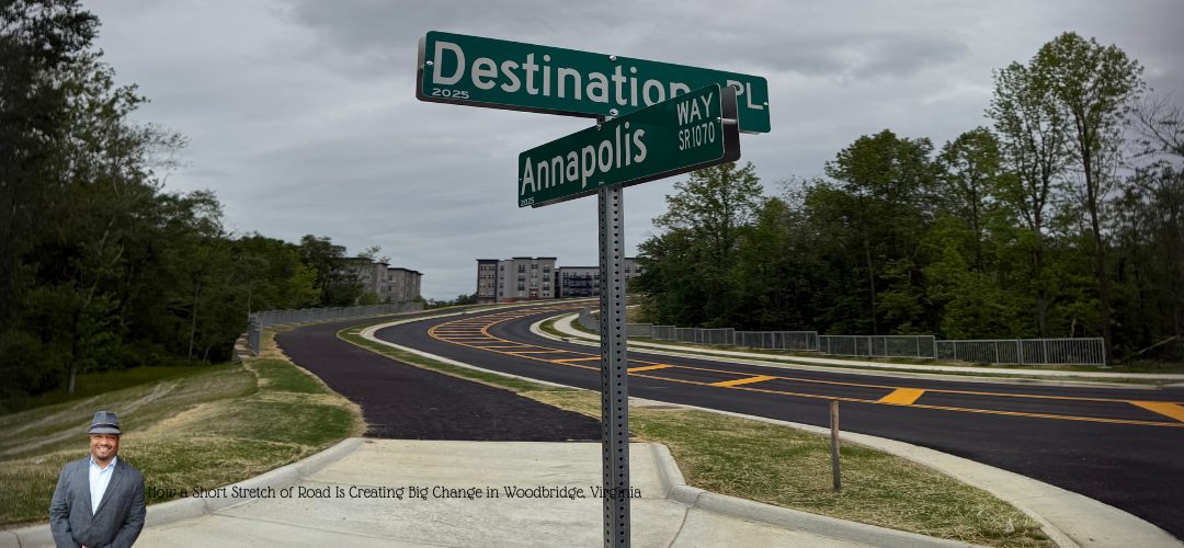 A road with green street signs reading "Destination PL" and "Annapolis WAY" against a backdrop of trees and residential buildings. A person in a suit and hat is overlaid at the bottom left corner with text, "How a Short Stretch of Road Is Creating Big Change in Woodbridge, Virginia."