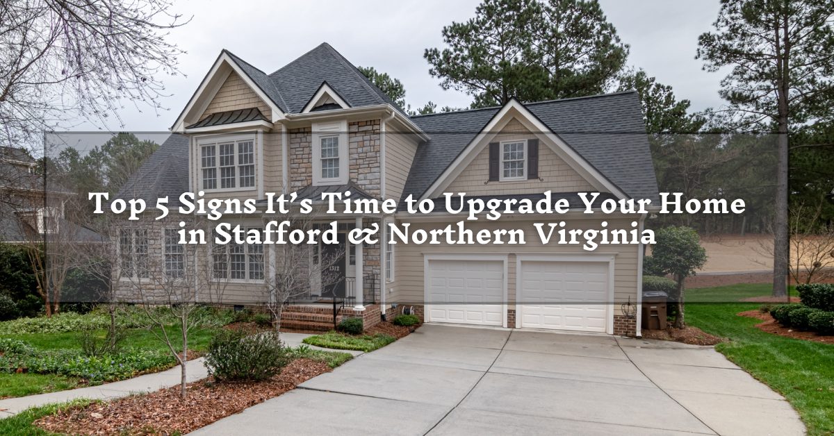 A charming two-story house with stone and siding exterior, featuring a front porch and a two-car garage. The driveway is bordered by well-maintained landscaping. Text on the image reads, "Top 5 Signs It’s Time to Upgrade Your Home in Stafford & Northern Virginia."