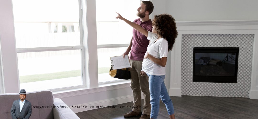A smiling couple standing on a brick path leading to a modern house, surrounded by greenery. A person in a suit and hat is overlaid in the bottom left corner with text, "Your Shortcut to a Smooth, Stress-Free Move in Woodbridge, Dumfries & Quantico."